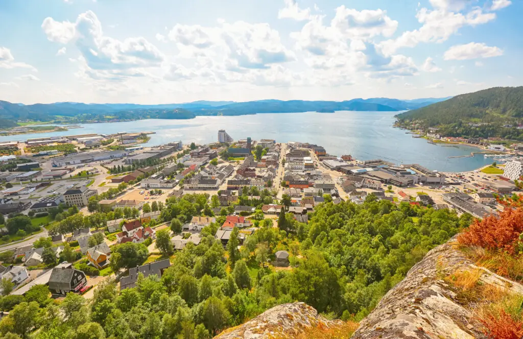 Aerial view of Namsos, Norway showcasing the scenic town, lush surroundings, and expansive waterfront, ideal for travel and tourism.