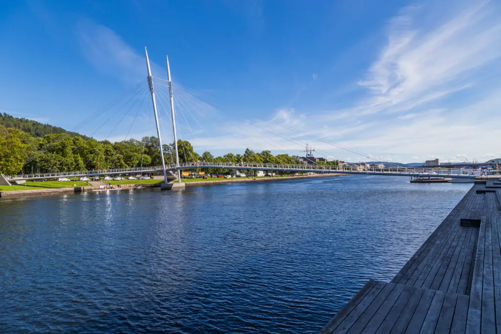 Ypsilon Bridge crossing the river in Drammen, Norway, highlighting modern architecture and scenic waterfront views.